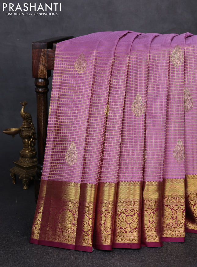 Pure kanchipuram silk saree pastel purple and wine shade with allover small zari checks & buttas and rich zari woven border