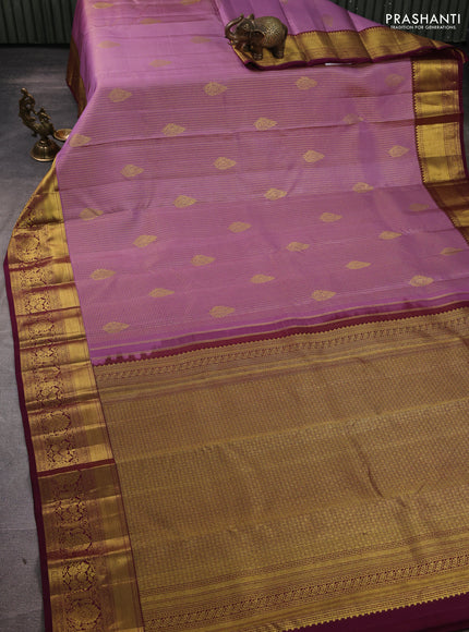 Pure kanchipuram silk saree pastel purple and wine shade with allover small zari checks & buttas and rich zari woven border