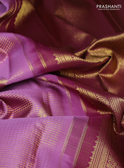 Pure kanchipuram silk saree pastel purple and wine shade with allover small zari checks & buttas and rich zari woven border