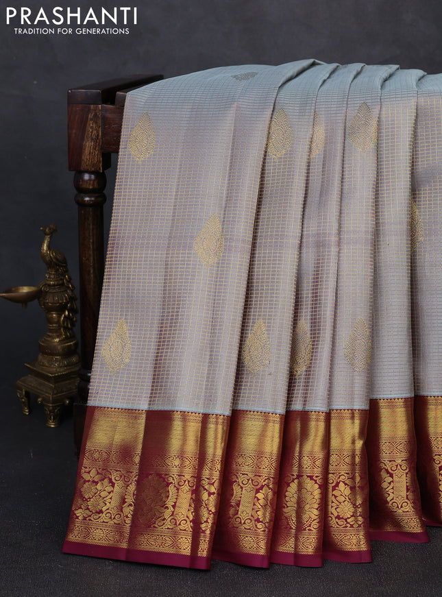 Pure kanchipuram silk saree grey and wine shade with allover small zari checks & buttas and rich zari woven border