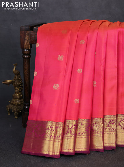Pure kanchipuram silk saree dual shade of pinkish orange and pink with zari woven buttas and rich zari woven border