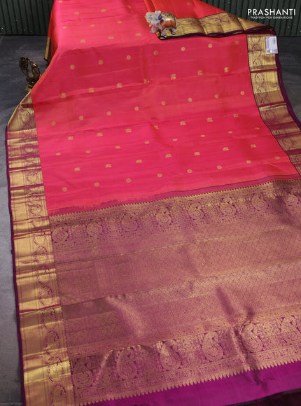 Pure kanchipuram silk saree dual shade of pinkish orange and pink with zari woven buttas and rich zari woven border