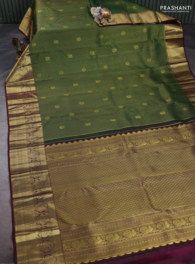 Pure kanchipuram silk saree green and coffee brown with allover small zari checks & buttas and long zari woven border
