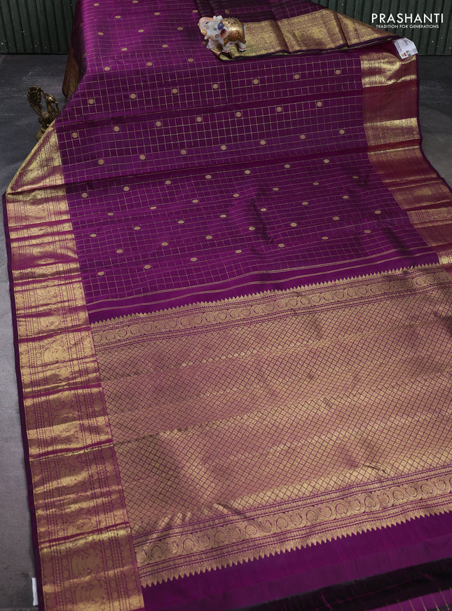 Pure kanchipuram silk saree wine shade with allover zari checks & buttas and long zari woven border