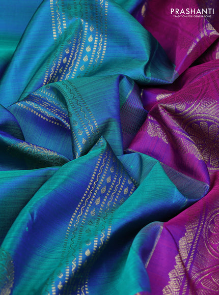Pure kanchipuram silk saree dual shade of bluish green and purple with zari woven buttas and rettapet zari woven border