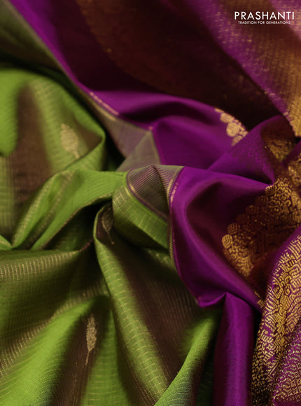 Pure kanchipuram silk saree mehendi green and purple with allover small zari checks & buttas and rettapet zari woven border
