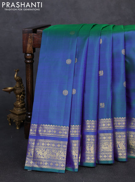Pure kanchipuram silk saree dual shade of bluish green with allover zari woven buttas and zari woven border