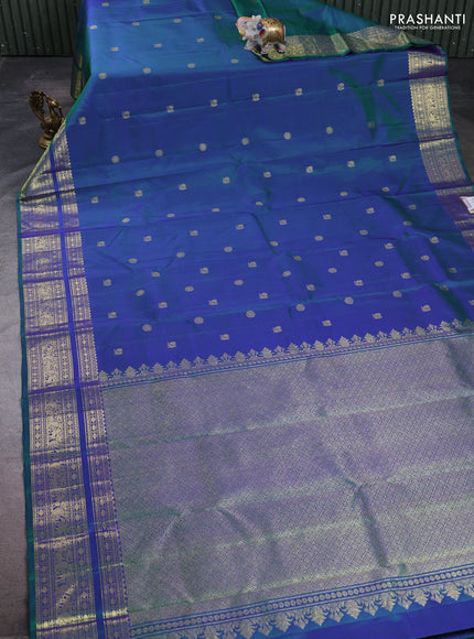Pure kanchipuram silk saree dual shade of bluish green with allover zari woven buttas and zari woven border