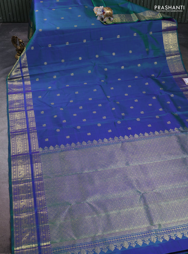 Pure kanchipuram silk saree dual shade of bluish green with allover zari woven buttas and zari woven border