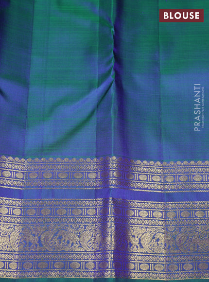 Pure kanchipuram silk saree dual shade of bluish green with allover zari woven buttas and zari woven border