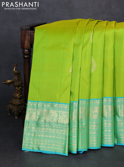 Pure kanchipuram silk saree fluorescent green and teal green with zari woven buttas and long zari woven border