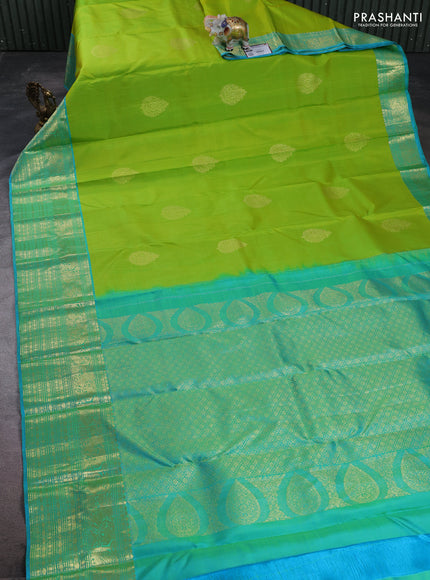 Pure kanchipuram silk saree fluorescent green and teal green with zari woven buttas and long zari woven border