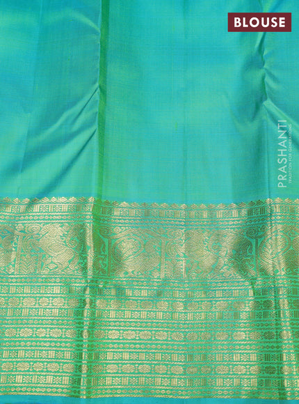 Pure kanchipuram silk saree fluorescent green and teal green with zari woven buttas and long zari woven border