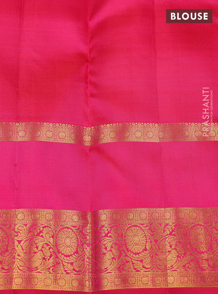 Pure kanchipuram silk saree dual shade of orange and pink with zari woven buttas and long rettapet zari woven border