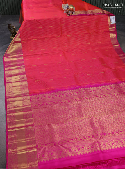 Pure kanchipuram silk saree dual shade of pinkish orange and pink with allover zari stripe pattern & buttas and long rich zari woven border