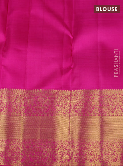Pure kanchipuram silk saree dual shade of pinkish orange and pink with allover zari stripe pattern & buttas and long rich zari woven border