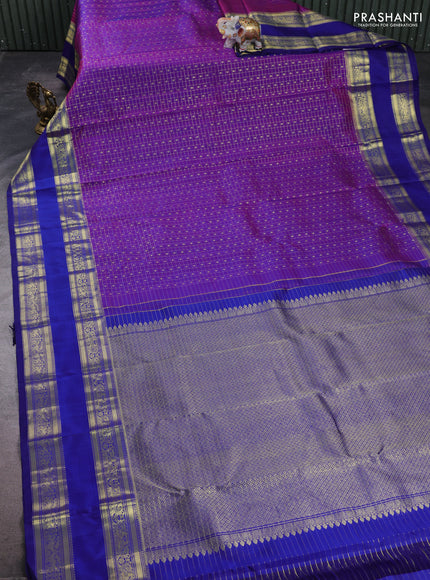 Pure kanchipuram silk saree purple and blue with allover small zari checks & buttas and long rettapet zari woven border