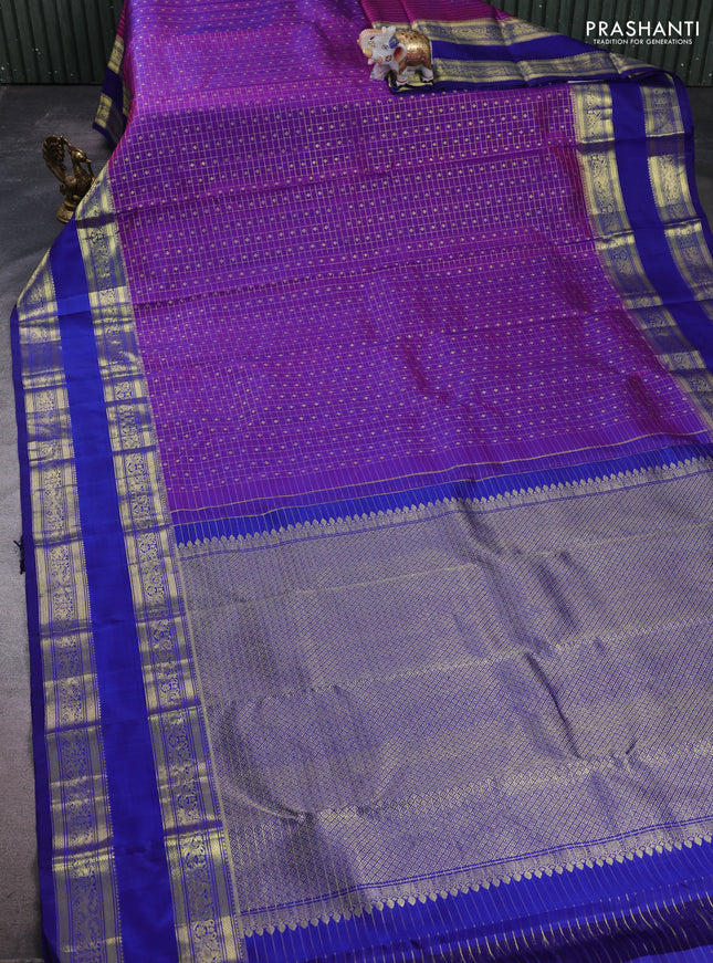 Pure kanchipuram silk saree purple and blue with allover small zari checks & buttas and long rettapet zari woven border