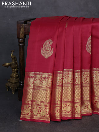 Pure kanchipuram silk saree maroon with zari woven buttas and long zari woven border