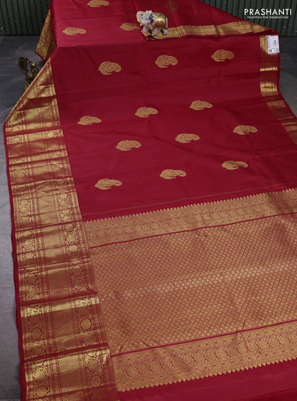 Pure kanchipuram silk saree maroon with zari woven buttas and long zari woven border