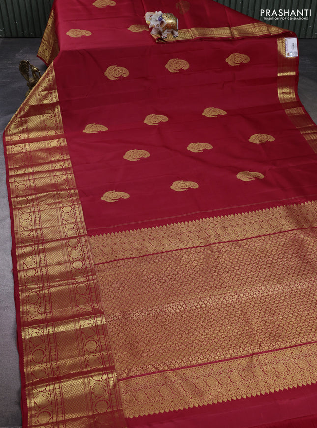 Pure kanchipuram silk saree maroon with zari woven buttas and long zari woven border