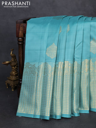Pure kanchipuram silk saree teal shade with zari woven buttas and long zari woven border