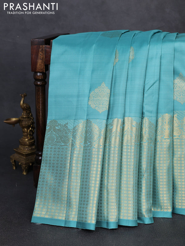 Pure kanchipuram silk saree teal shade with zari woven buttas and long zari woven border