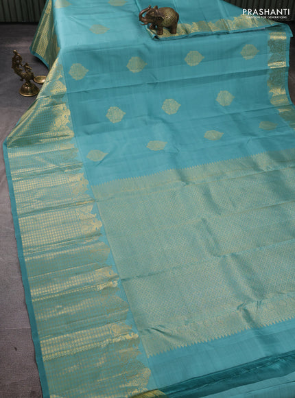Pure kanchipuram silk saree teal shade with zari woven buttas and long zari woven border