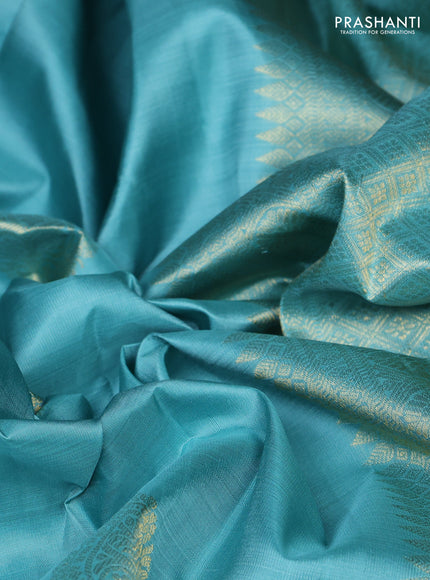 Pure kanchipuram silk saree teal shade with zari woven buttas and long zari woven border