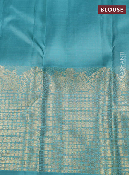 Pure kanchipuram silk saree teal shade with zari woven buttas and long zari woven border