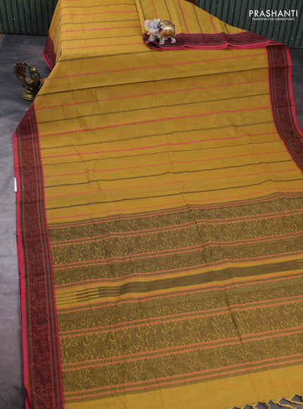 Kanchi cotton saree mustard yelloew and pink with allover thread weaves pattern and thread woven border