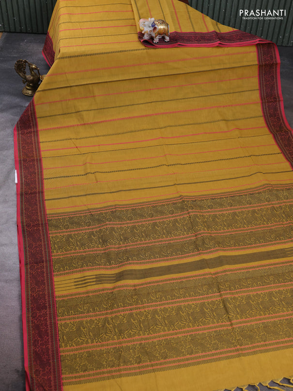 Kanchi cotton saree mustard yelloew and pink with allover thread weaves pattern and thread woven border
