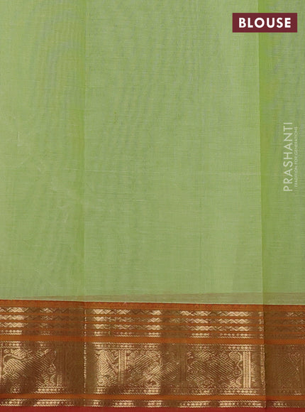 Kanchi cotton saree pista green and orange with allover zari woven checked pattern and zari woven border
