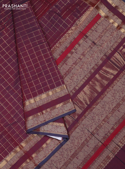 Kanchi cotton saree dual shade of maroon and blue shade with allover zari woven checked pattern and rettapet thread & zari woven border