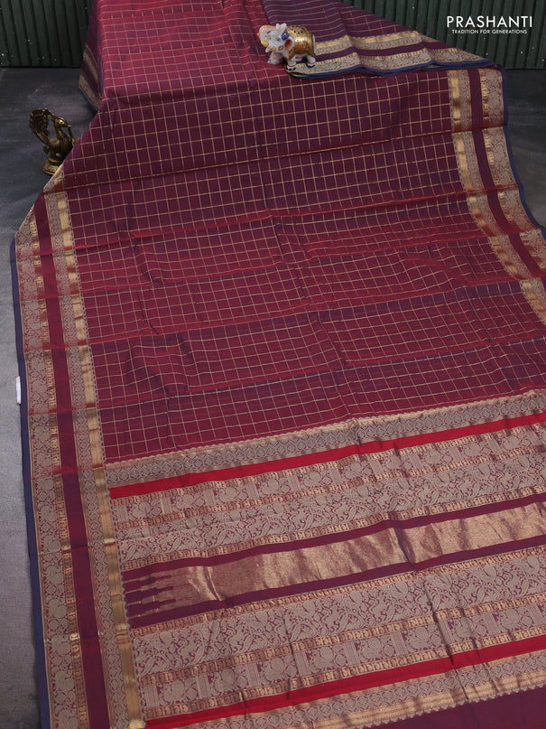 Kanchi cotton saree dual shade of maroon and blue shade with allover zari woven checked pattern and rettapet thread & zari woven border