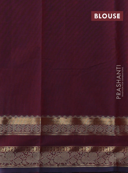 Kanchi cotton saree dual shade of maroon and blue shade with allover zari woven checked pattern and rettapet thread & zari woven border