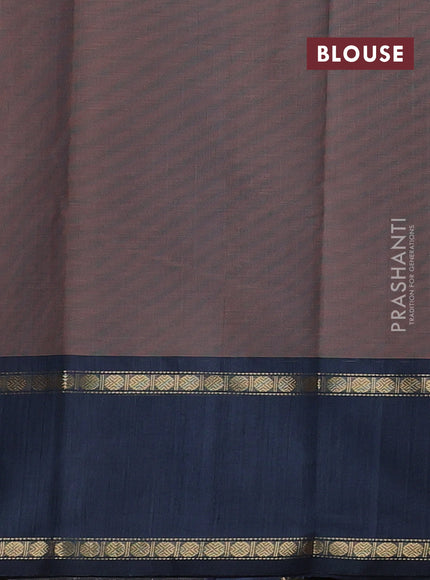 Kanchi cotton saree dual shade of rust and greyish blue with allover zari stripe pattern and rettapet zari woven border