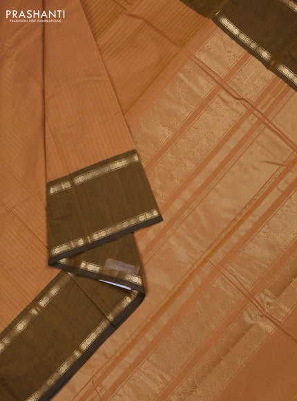 Kanchi cotton saree sandal and dark mustard with allover zari stripe pattern and rettapet zari woven border