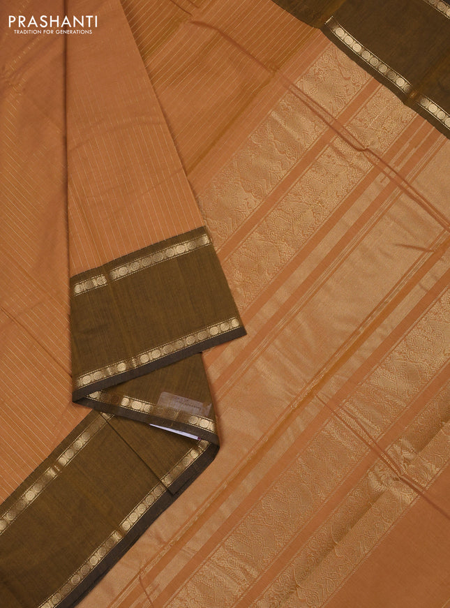 Kanchi cotton saree sandal and dark mustard with allover zari stripe pattern and rettapet zari woven border