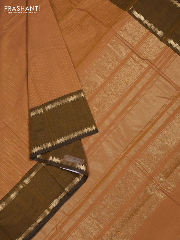 Kanchi cotton saree sandal and dark mustard with allover zari stripe pattern and rettapet zari woven border