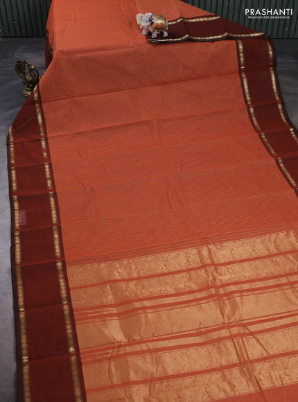 Kanchi cotton saree rust shade and brown with allover zari stripe pattern and rettapet zari woven border