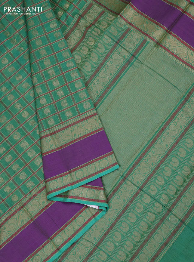 Kanchi cotton saree teal green and violet with allover thread checks & buttas and rettapet thread woven border