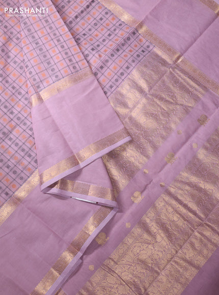 Kanchi cotton saree mild lavender with allover thread checks & buttas and long rettapet zari woven border