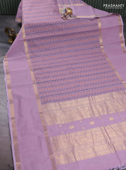 Kanchi cotton saree mild lavender with allover thread checks & buttas and long rettapet zari woven border