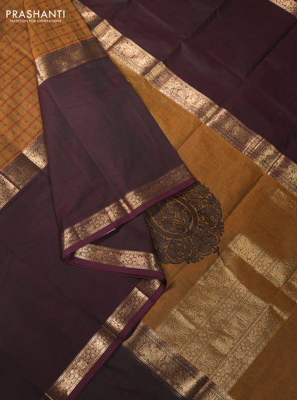 Kanchi cotton saree dark mustard and dual shade of bottle green with allover thread checks & buttas and long rettapet zari woven border
