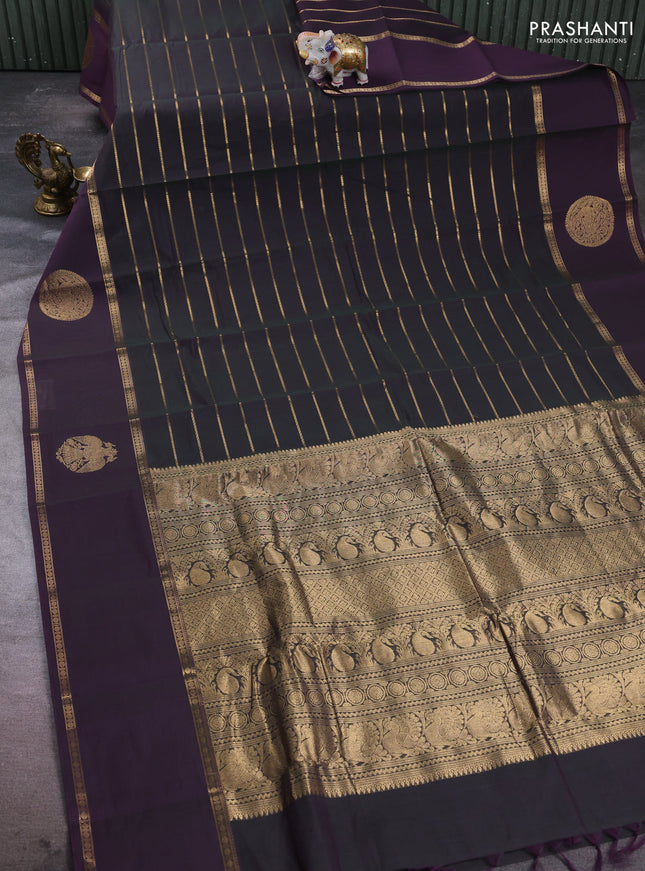 Kanchi cotton saree dual shade of greenish purple and purple with allover veldhari zari weaves and rettapet zari woven border