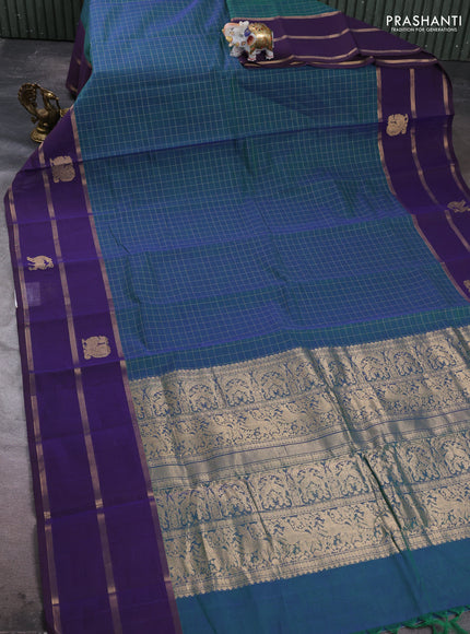 Kanchi cotton saree dual shade of green and deep violet with allover thread woven checked pattern and long zari woven butta border