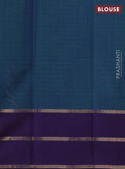 Kanchi cotton saree dual shade of green and deep violet with allover thread woven checked pattern and long zari woven butta border