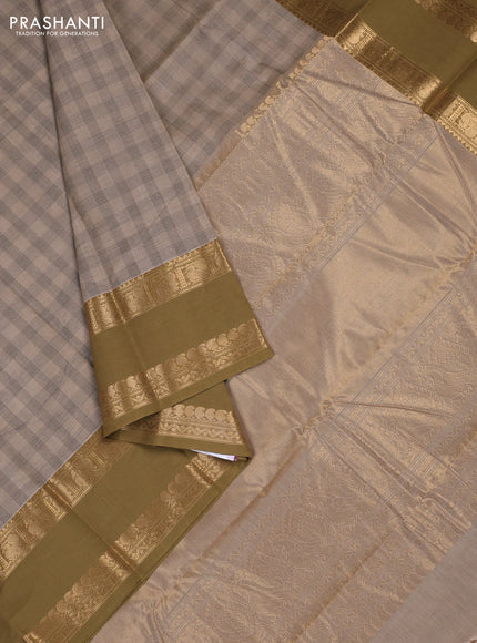 Kanchi cotton saree beige and mehendi green with allover thread woven checked pattern and rettapet zari woven border