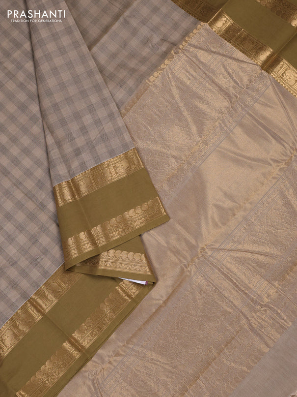 Kanchi cotton saree beige and mehendi green with allover thread woven checked pattern and rettapet zari woven border